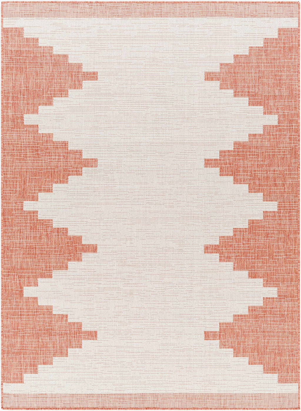 Peach geometric outdoor rug with Aztec-inspired pattern