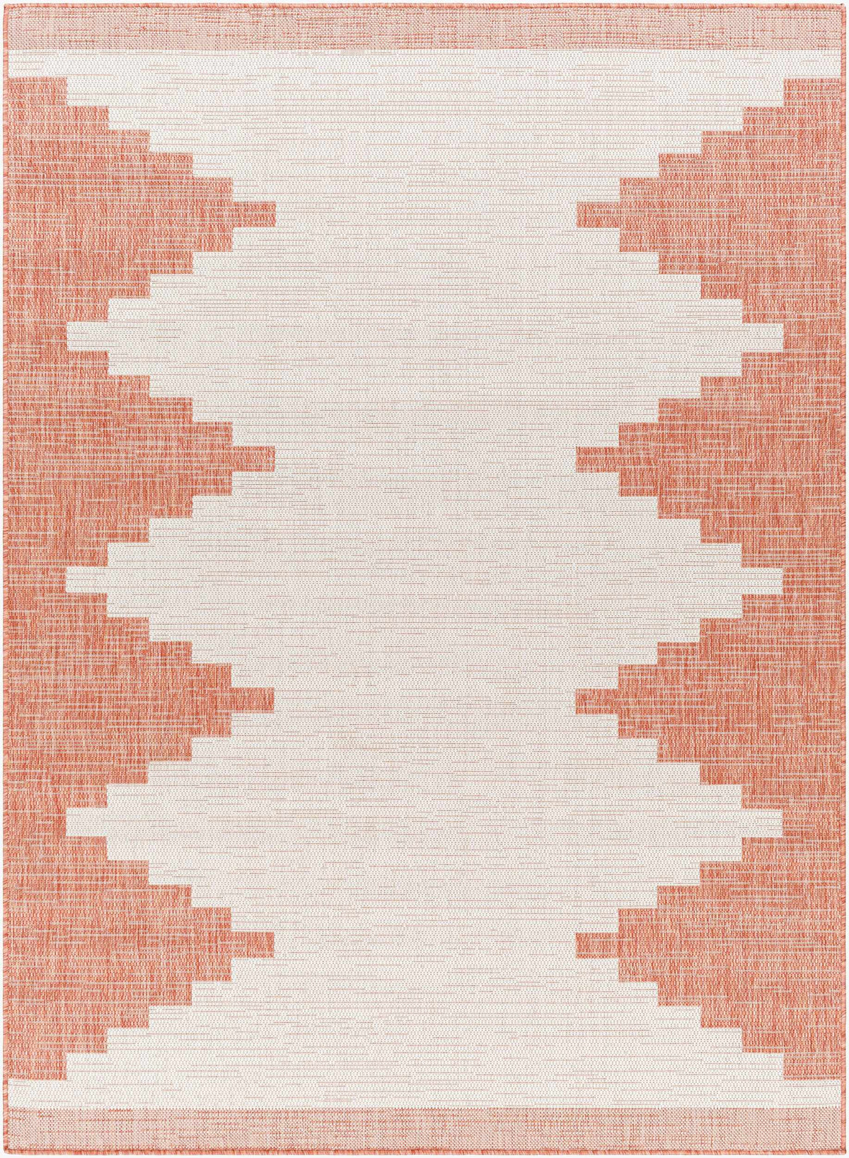 Peach geometric outdoor rug with Aztec-inspired pattern