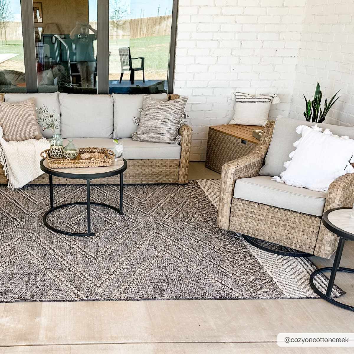 Areli beige charcoal rug styled with neutral furnishings