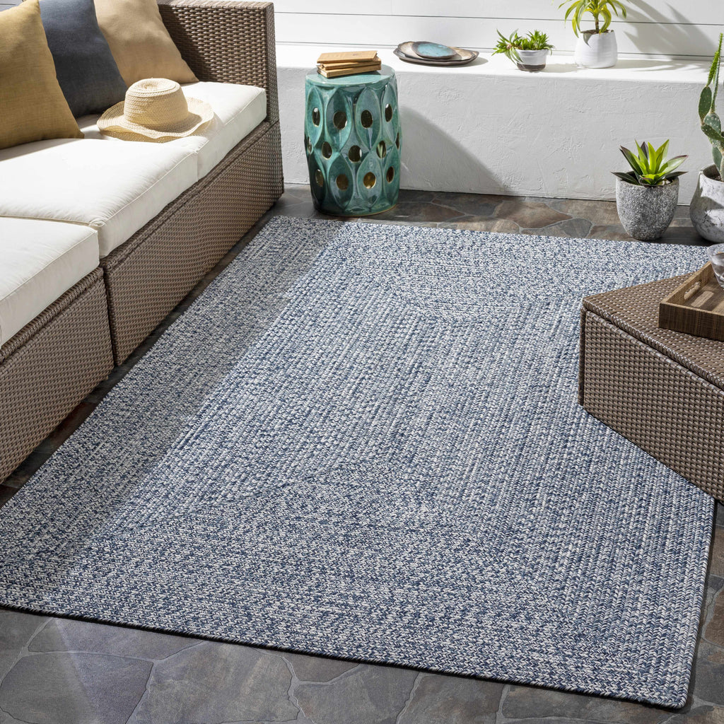 Carbrook faux jute rug in a furnished room setting
