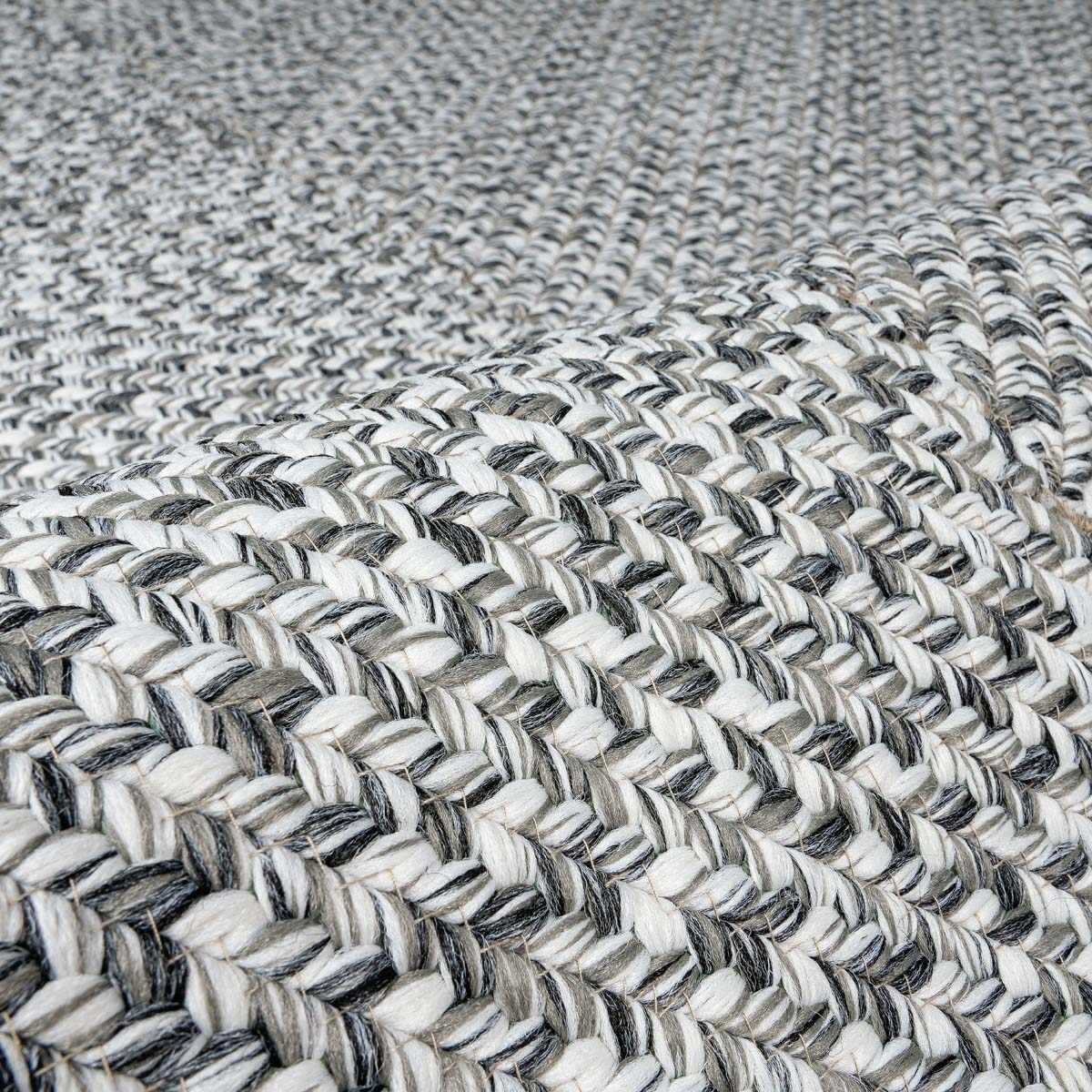 Cranwell cream charcoal braided rug folded detail