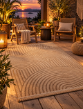 Cologne beige indoor outdoor rug styled in a warm outdoor living space