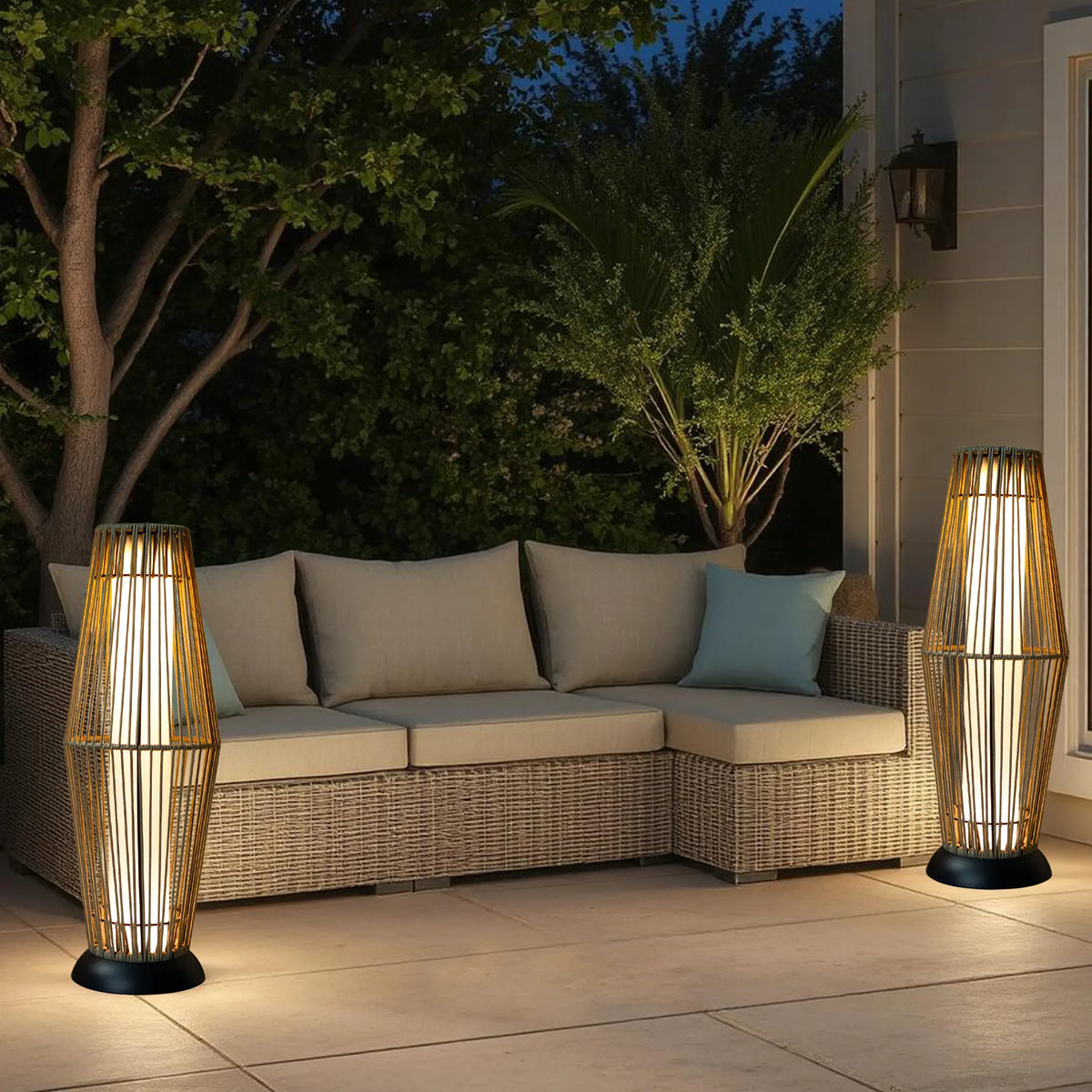Grey woven solar lantern with stable freestanding base