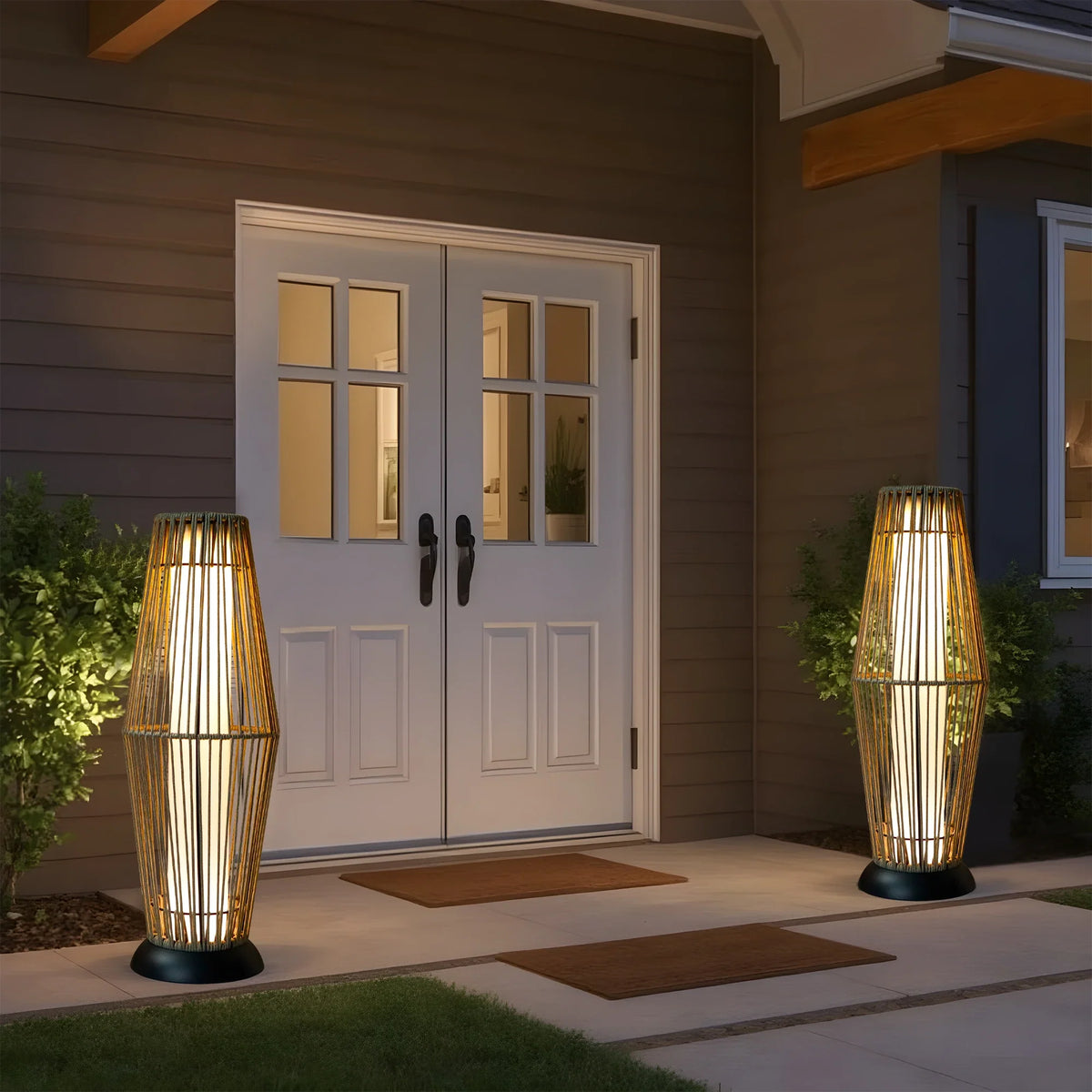 Outdoor woven solar floor lantern showing rope and steel construction