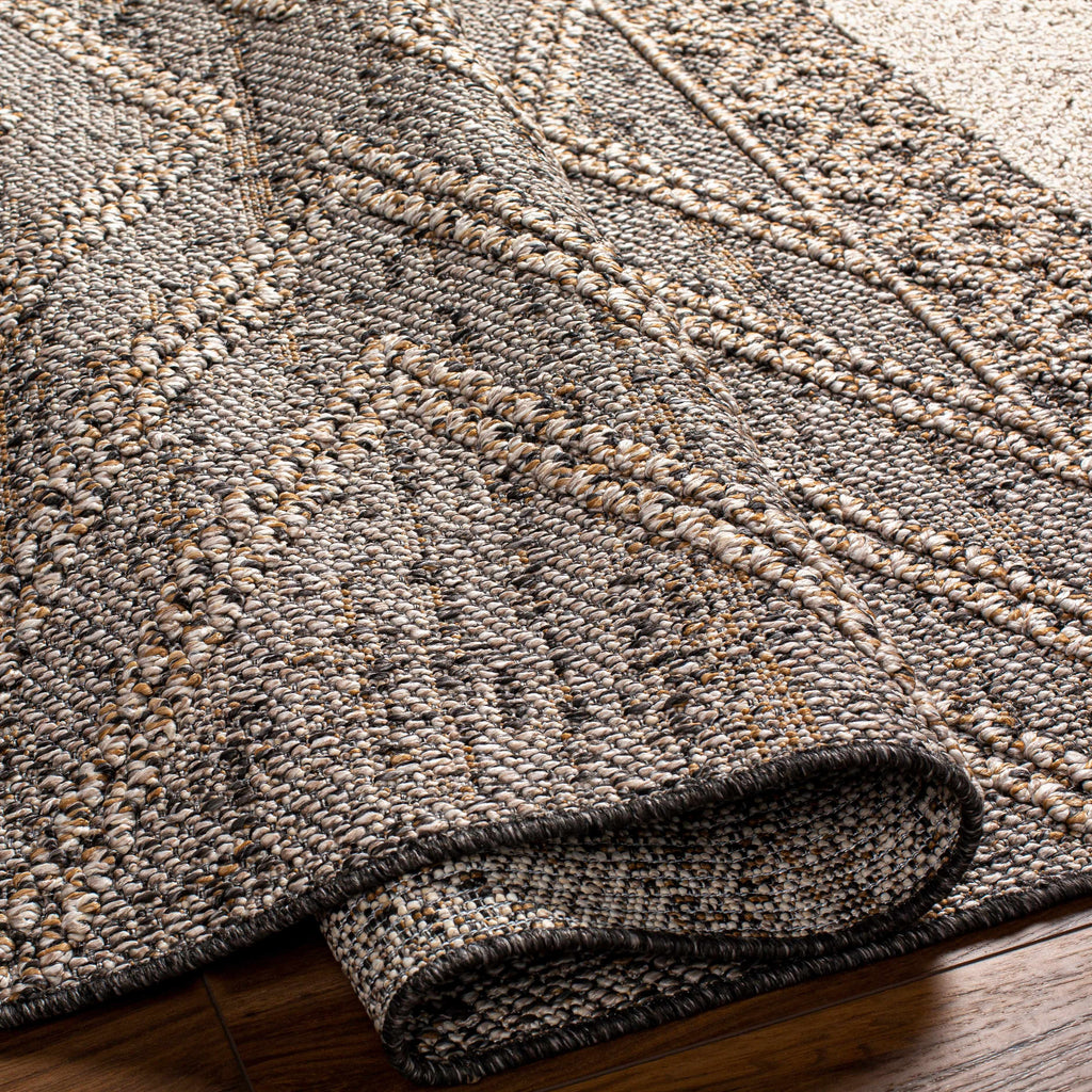 Folded Areli rug showing pile and construction