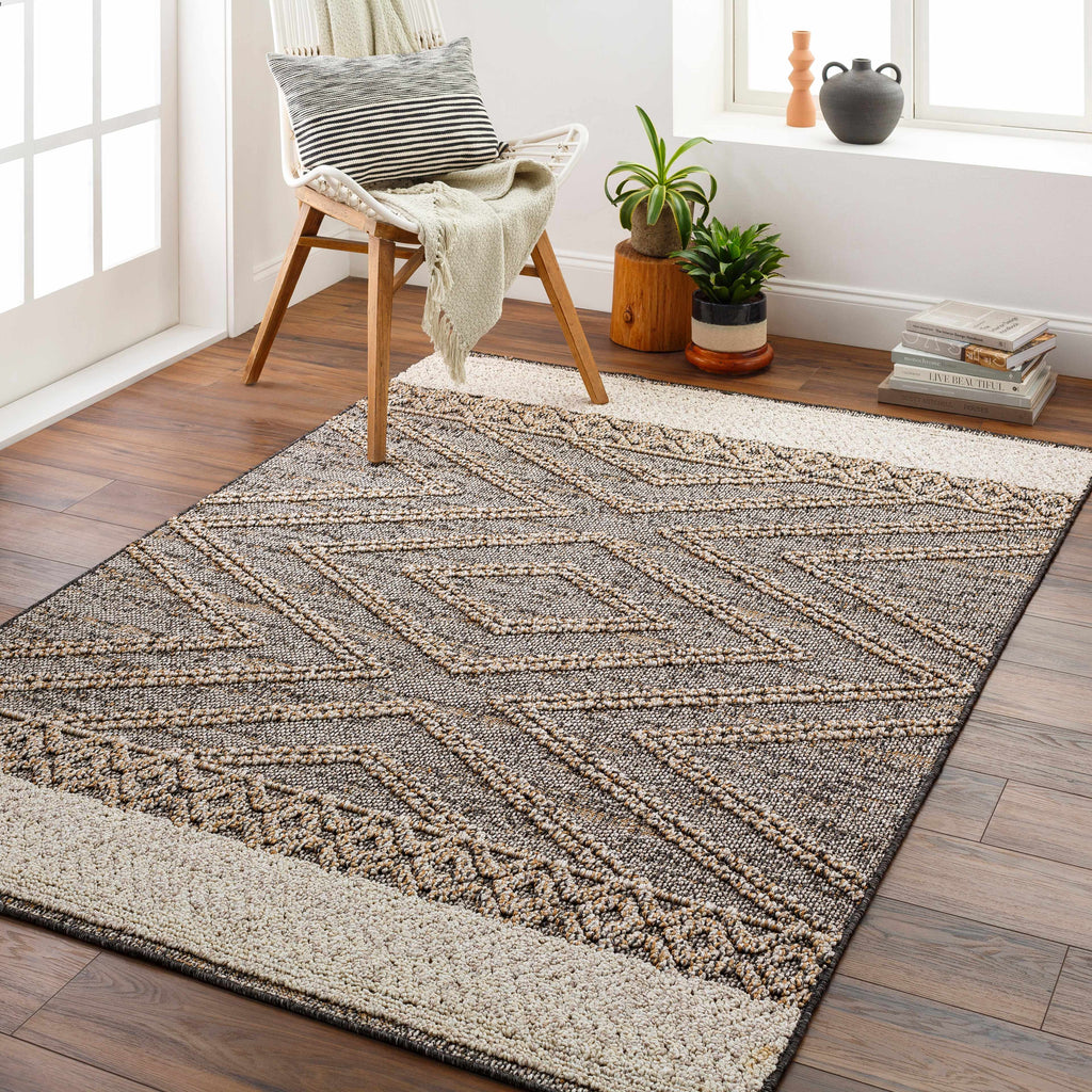Areli indoor outdoor rug in a furnished room setting